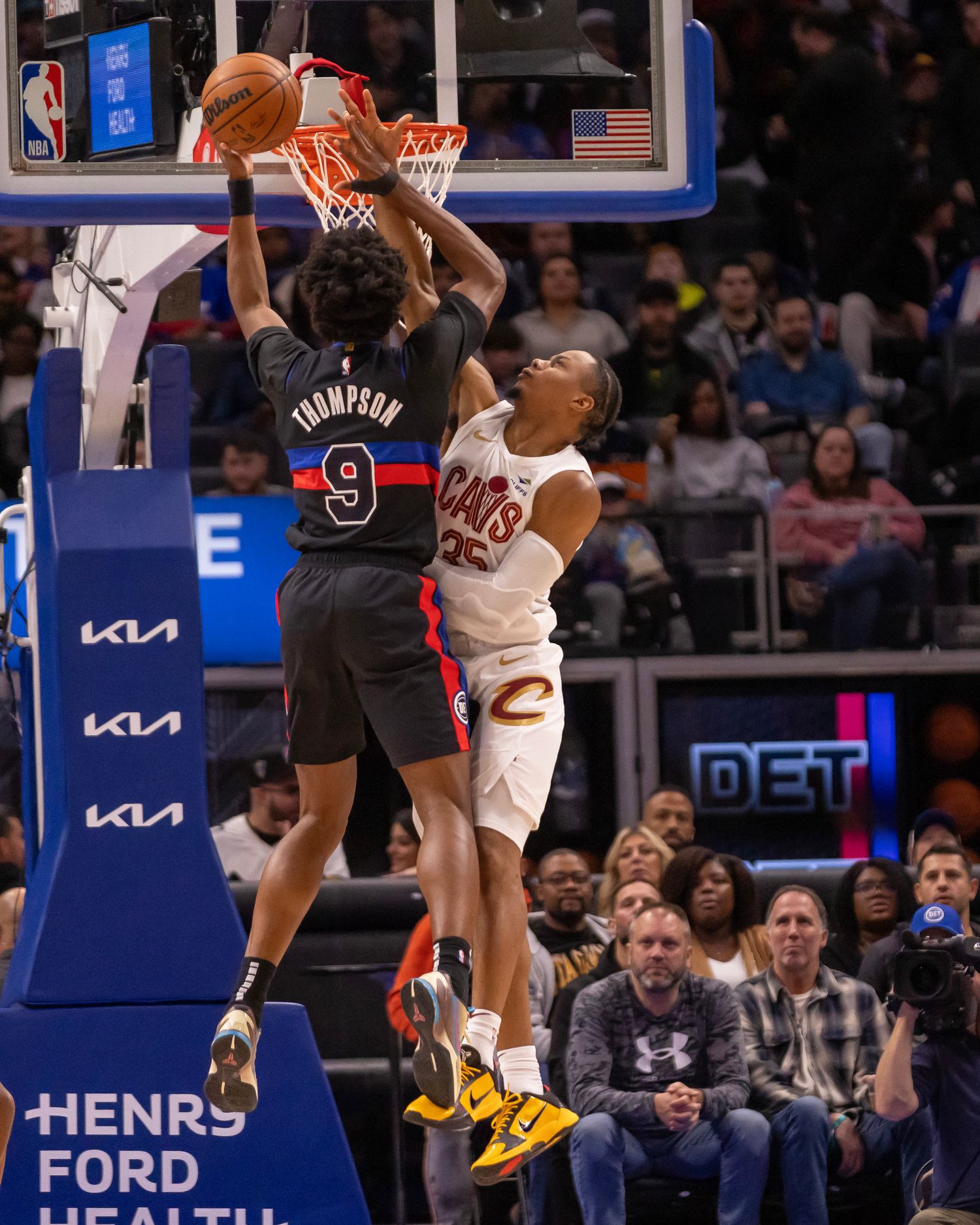 Dec 2, 2023; Detroit, Michigan, USA; Detroit Pistons forward Ausar Thompson (9) drives to the basket as Cleveland Cavaliers forward Isaac Okoro (35) defends during the first half at Little Caesars Arena. Mandatory Credit: David Reginek-USA TODAY Sports
